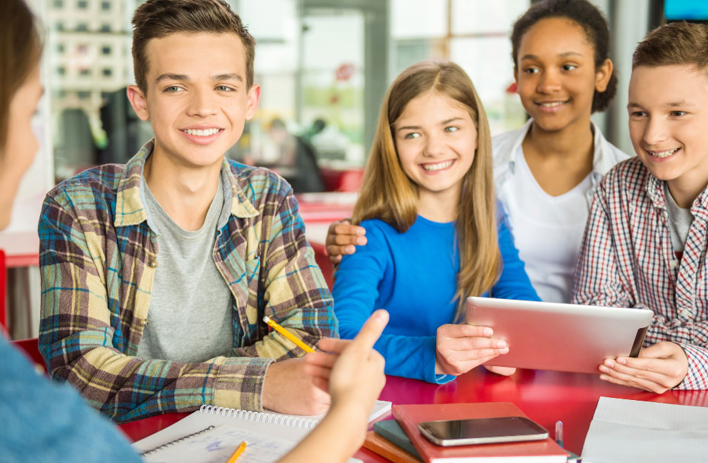 Teens Group of diverse young teens at school